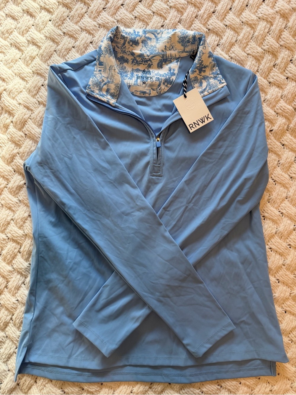 RNWK Golf Women’s Light Blue Quarter-Zip Pullover Top